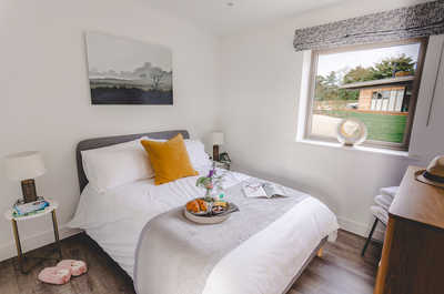 The master bedroom features 1 Double bed.