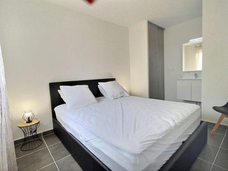 image Drift to sleep in a comfortable bed after a wonderful day outside. Bedding configurations vary.