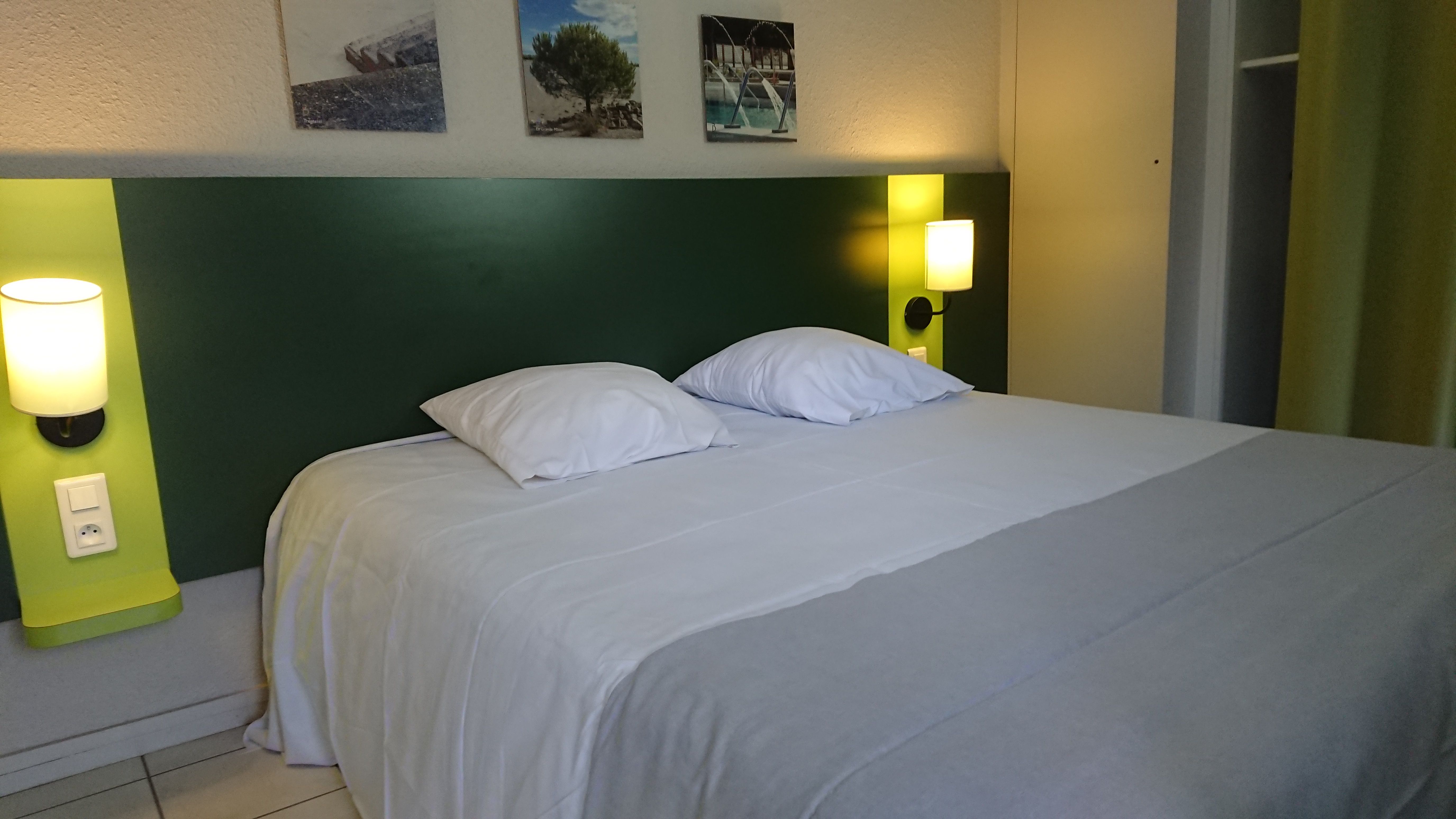 image Drift to sleep in a comfortable bed after a wonderful day outside.