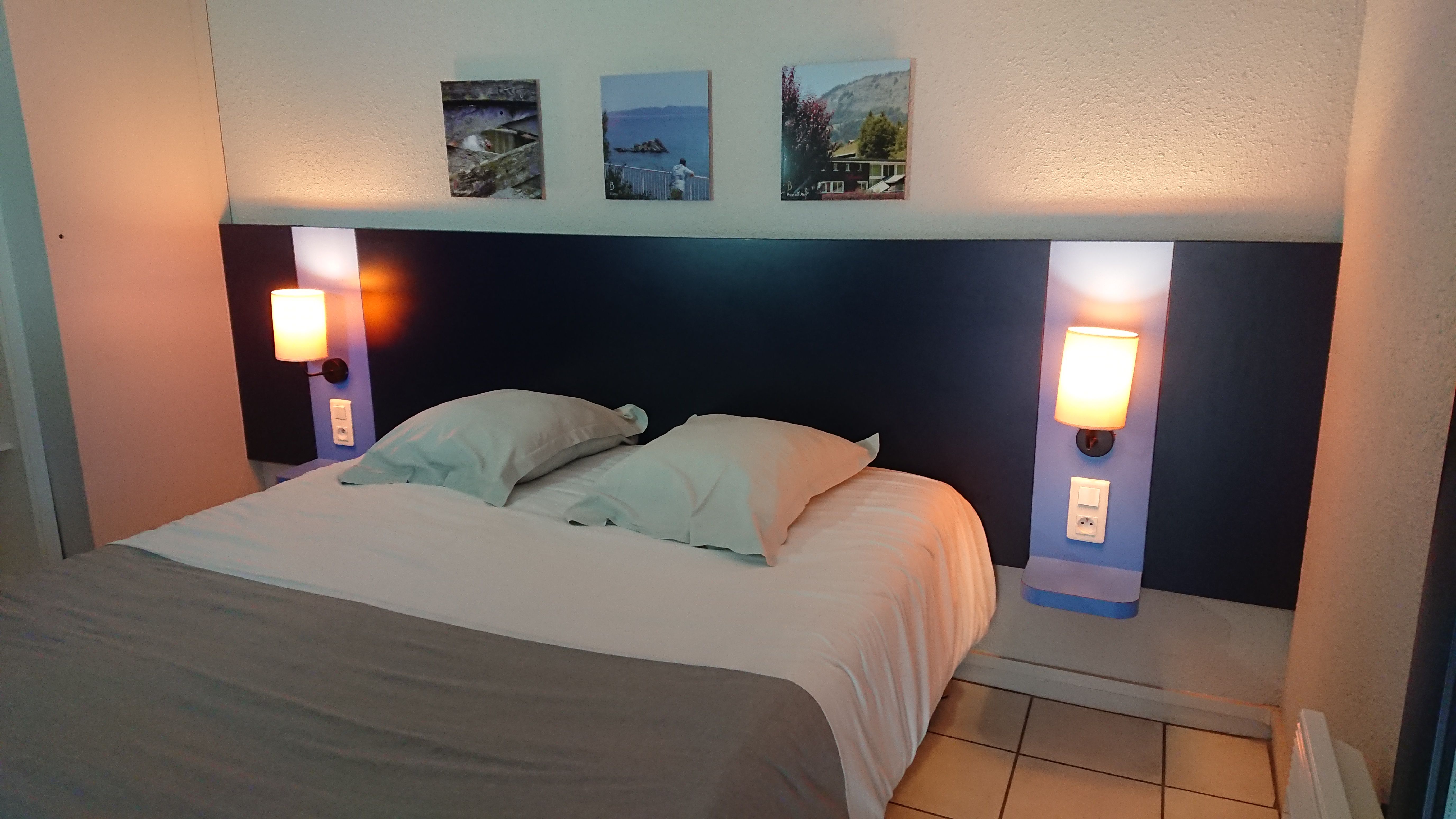 image Drift to sleep in a comfortable bed after a wonderful day outside.