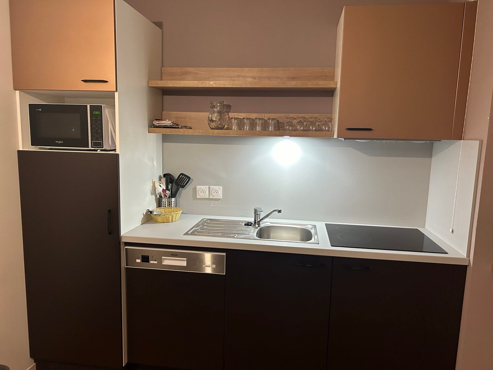 image Fridge, electric hob, oven, and dishwasher in the kitchenette — fully set up for a self-catered stay