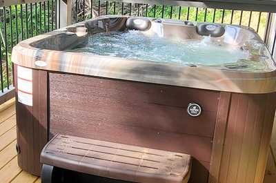 Relax in the lovely hot tub!