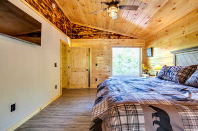 The master bedroom features a plush King bed.