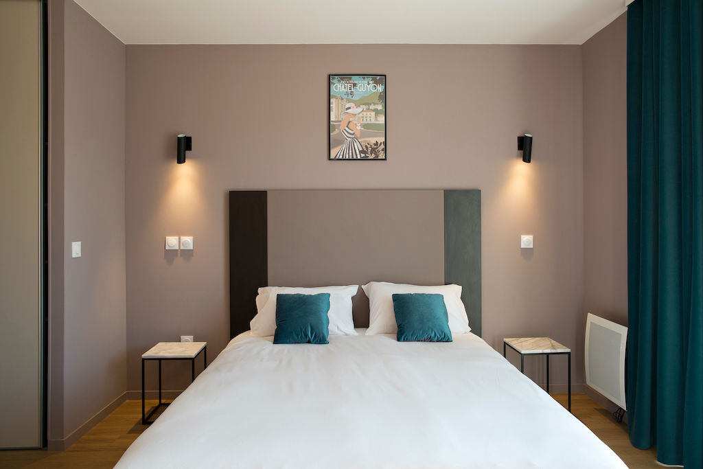image Drift to sleep in a comfortable bed after a wonderful day outside.