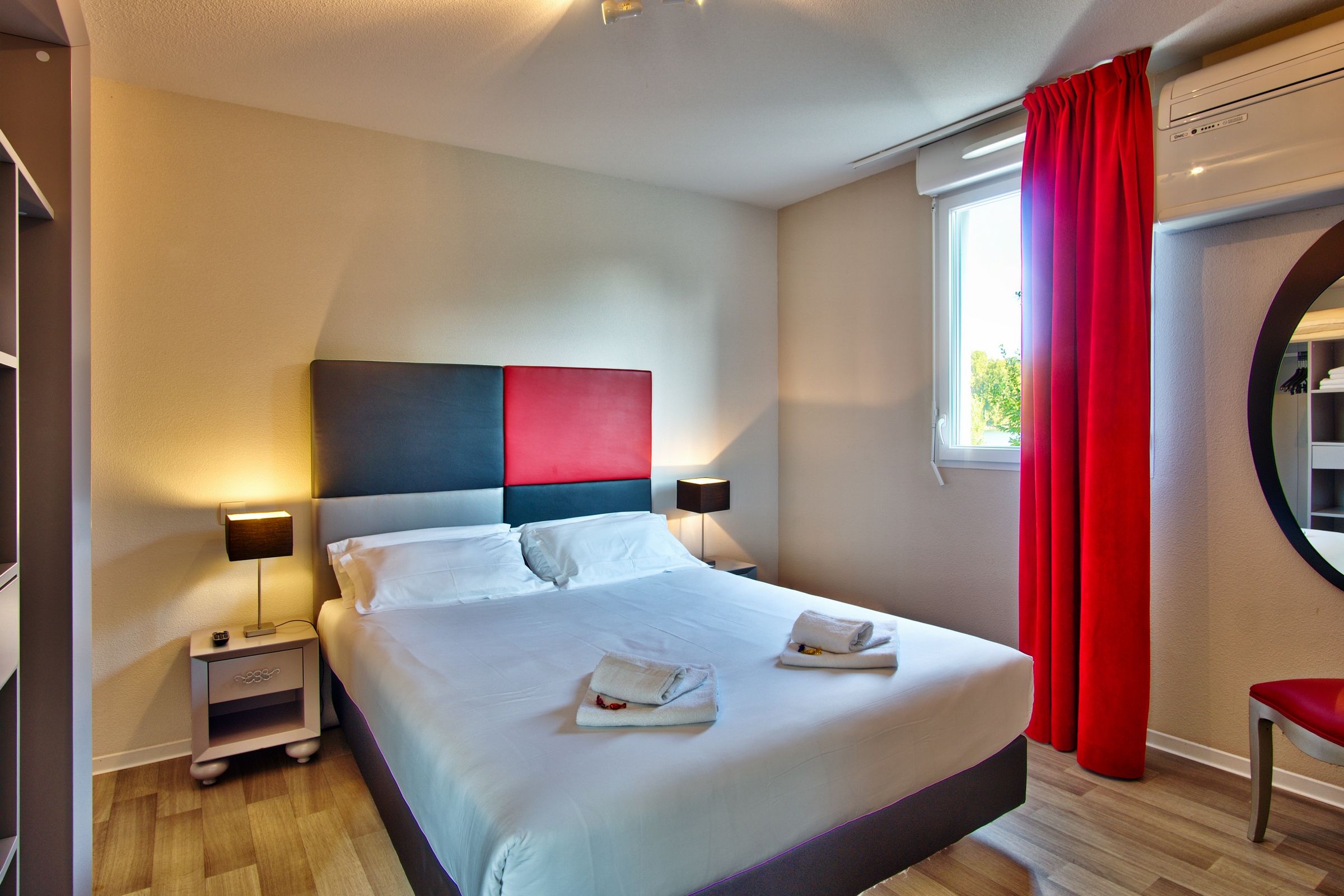 image Drift to sleep in a comfortable bed after a wonderful day outside.