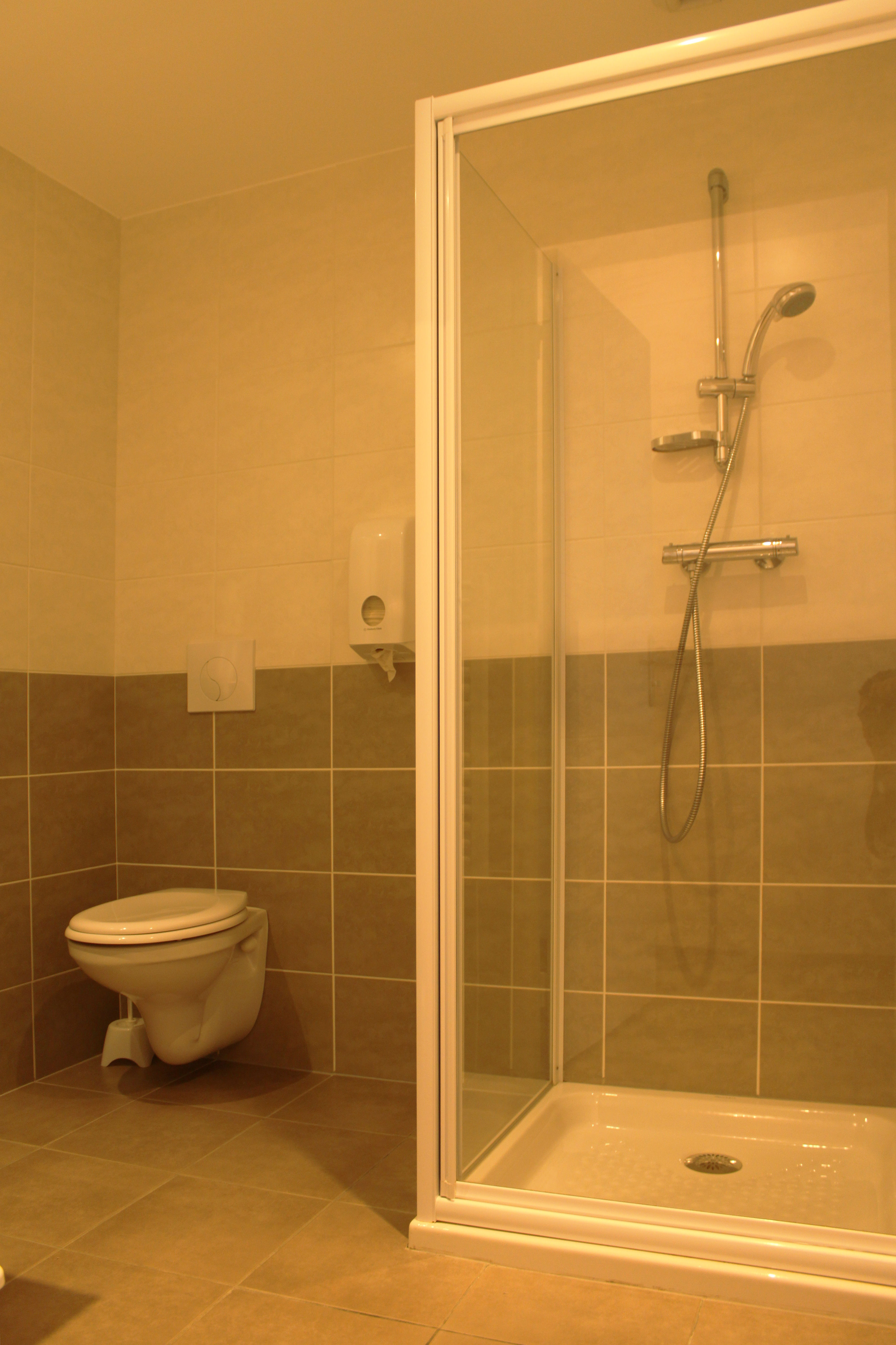 image Freshen up in the bathroom after a day of adventure.