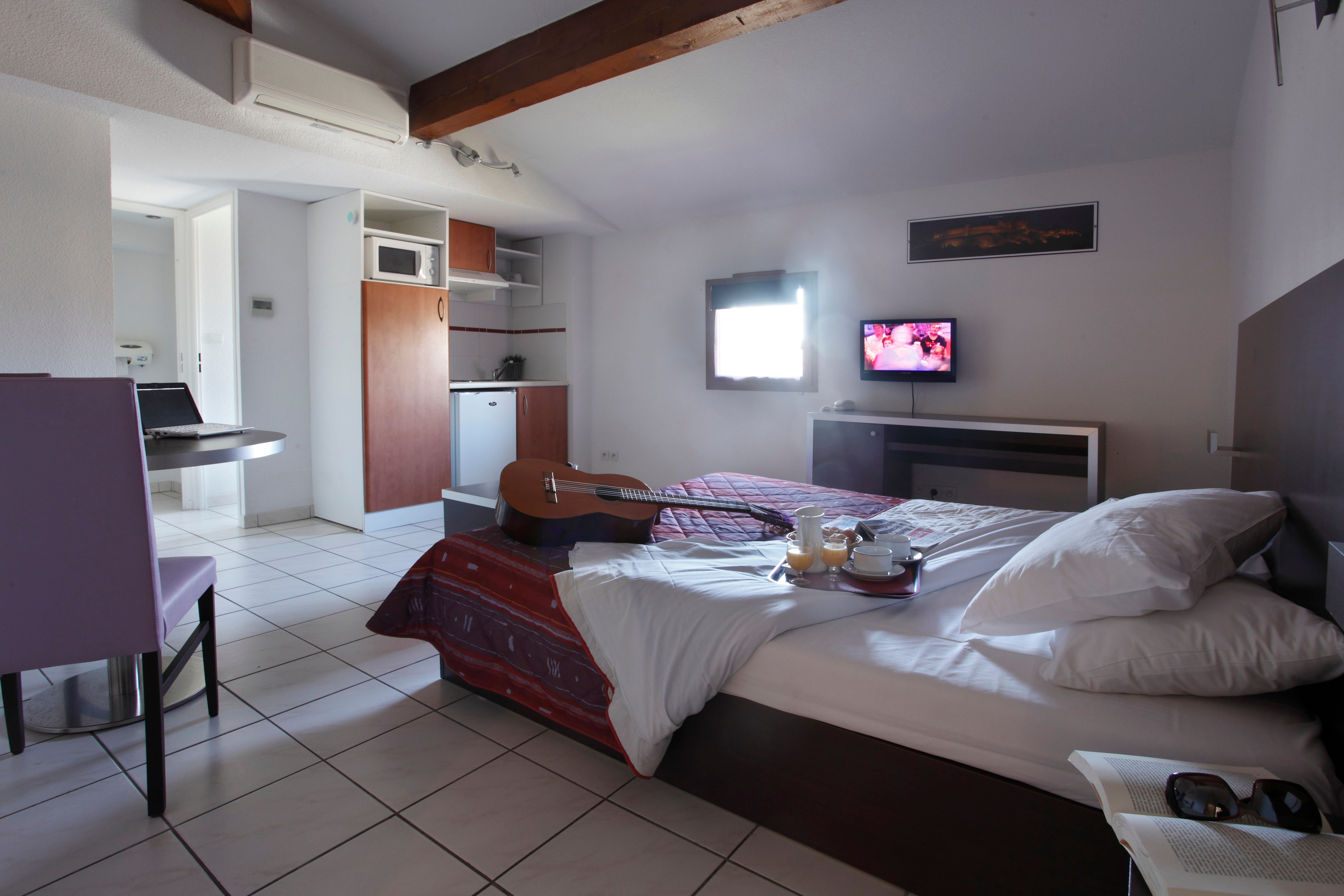 image Drift to sleep in a comfortable bed after a wonderful day outside.
