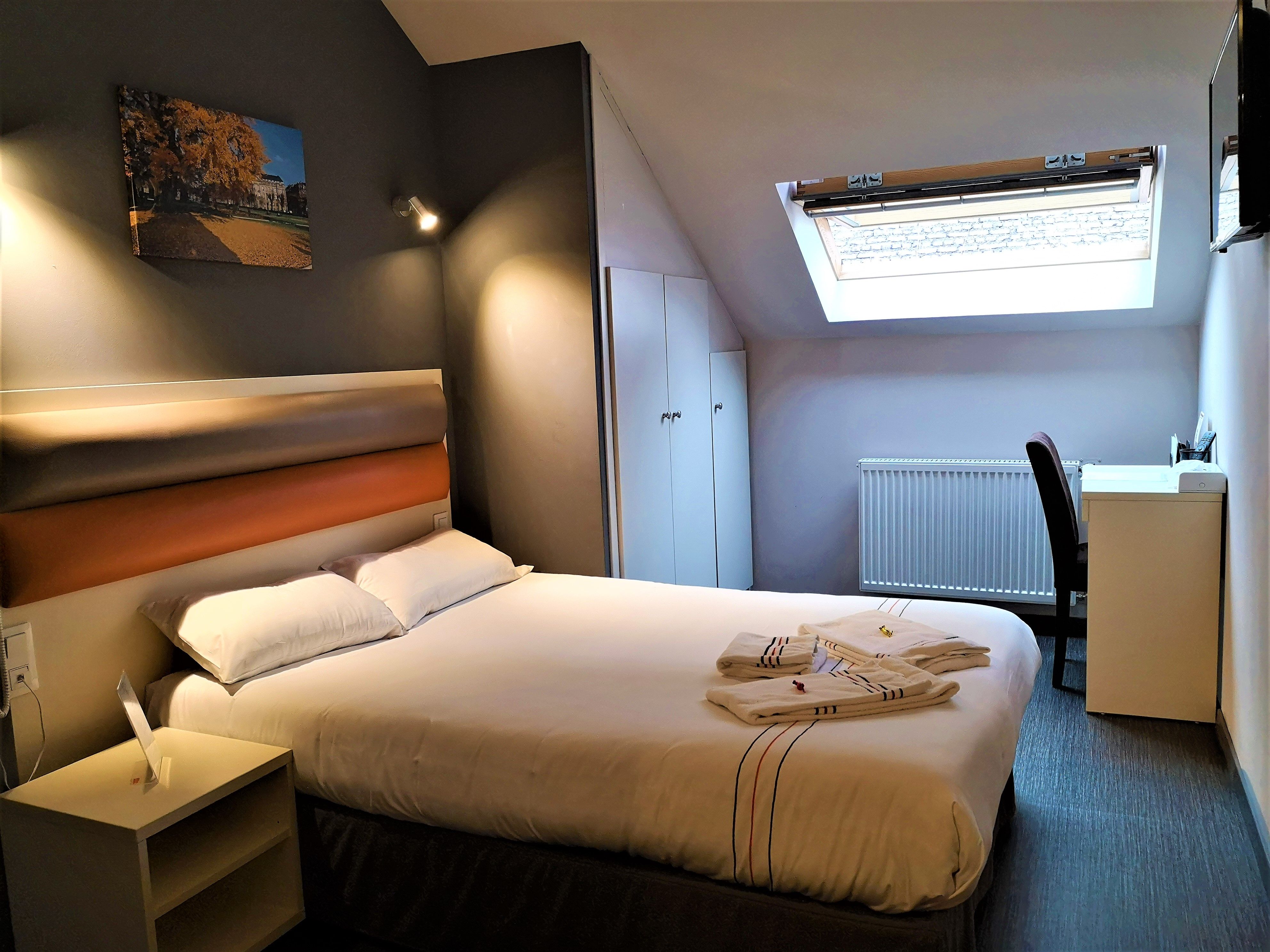 image Drift to sleep in a comfortable bed after a wonderful day outside.