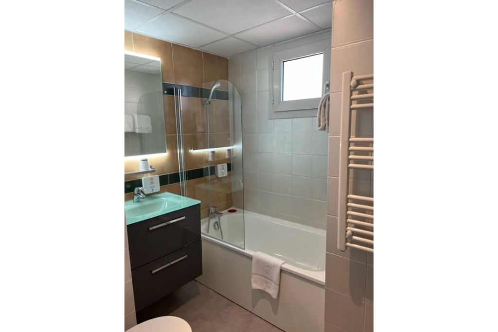 image Freshen up in the bathroom after a day of adventure.