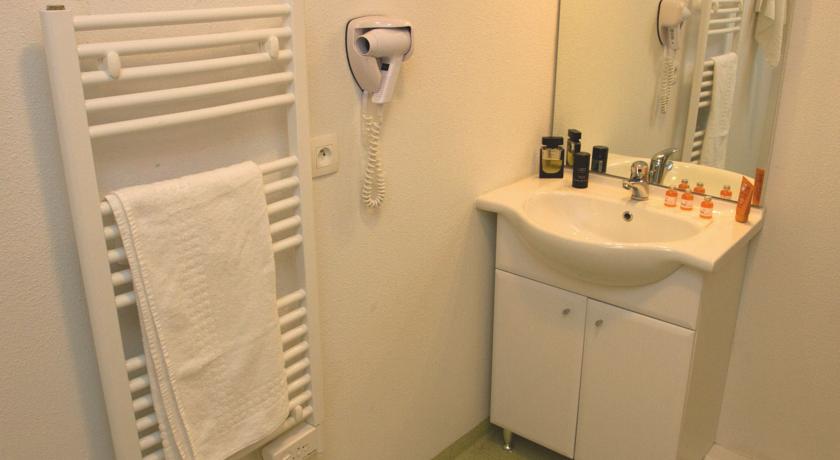 image Freshen up in the bathroom after a day of adventure.