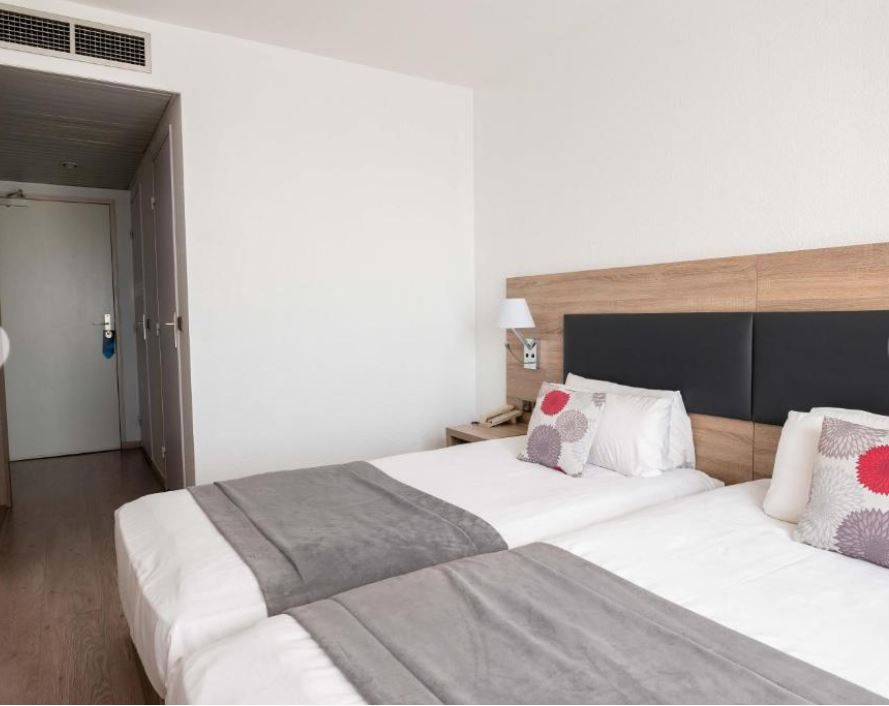 image Drift to sleep in a comfortable bed after a wonderful day outside.
