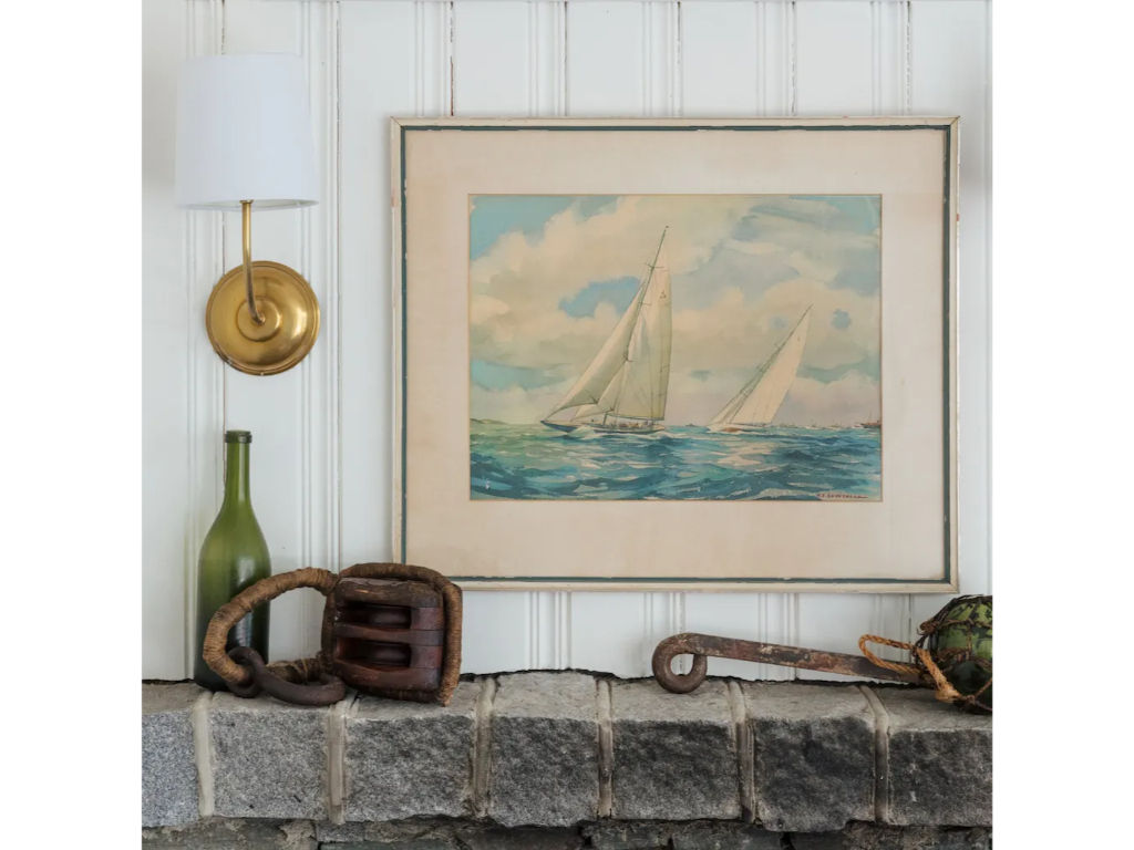 image Coastal accents and seafaring art tell quiet stories of wind, waves, and timeless charm.