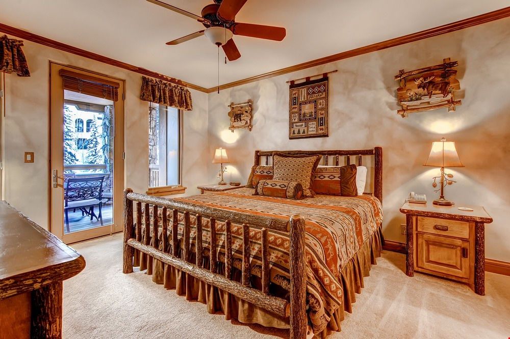 image Get a good night's sleep in the master bedroom. Bedding configurations vary.