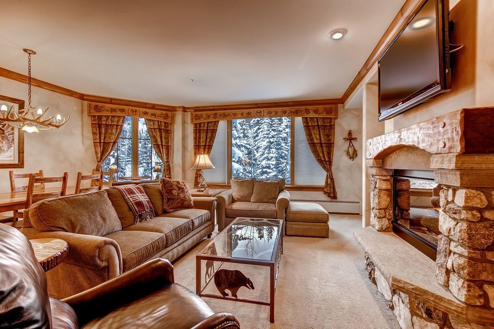 image Relax and unwind with a movie or in front of the fireplace in the spacious living area.