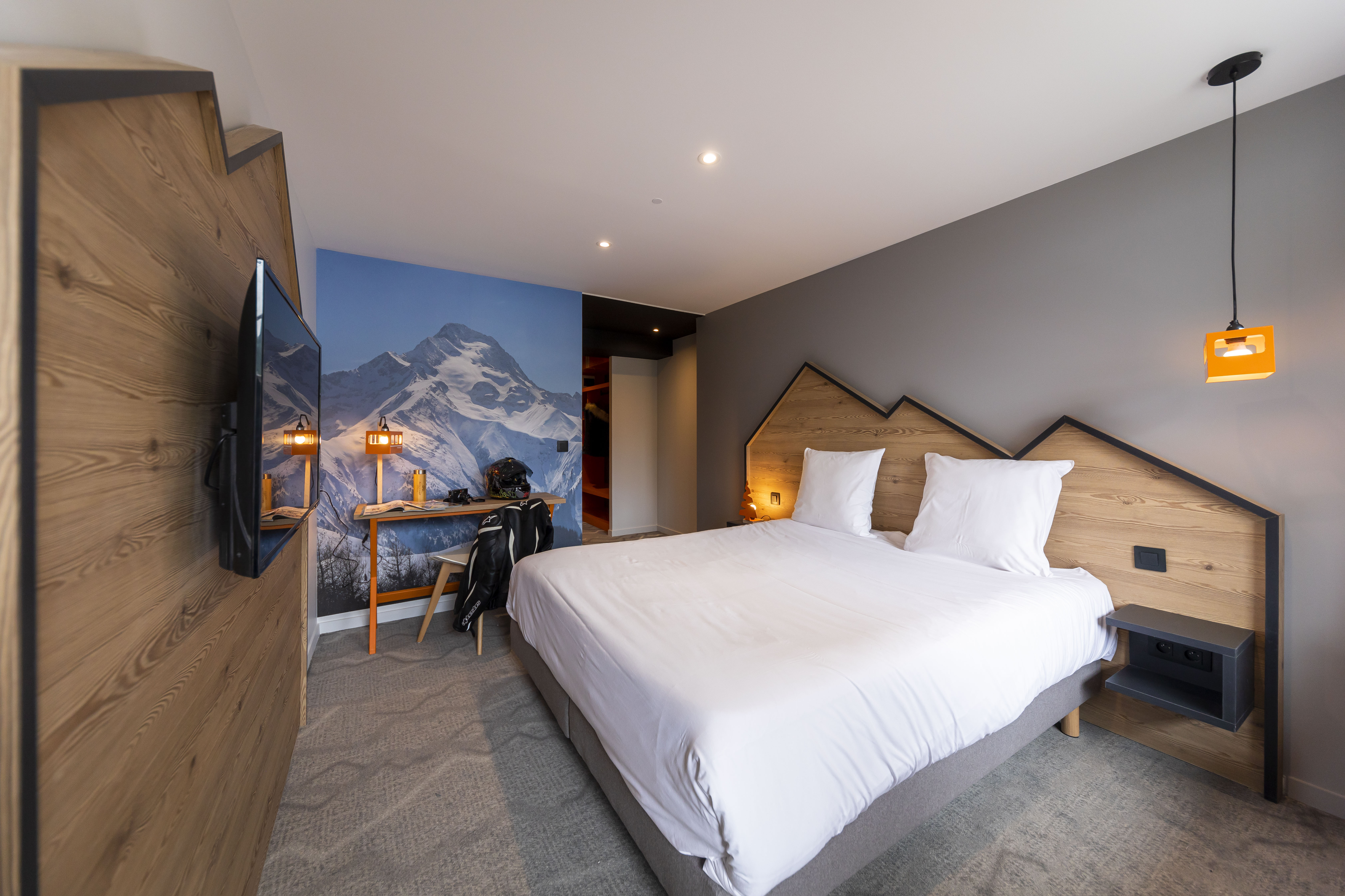 image Drift to sleep in a comfortable bed after a wonderful day outside.