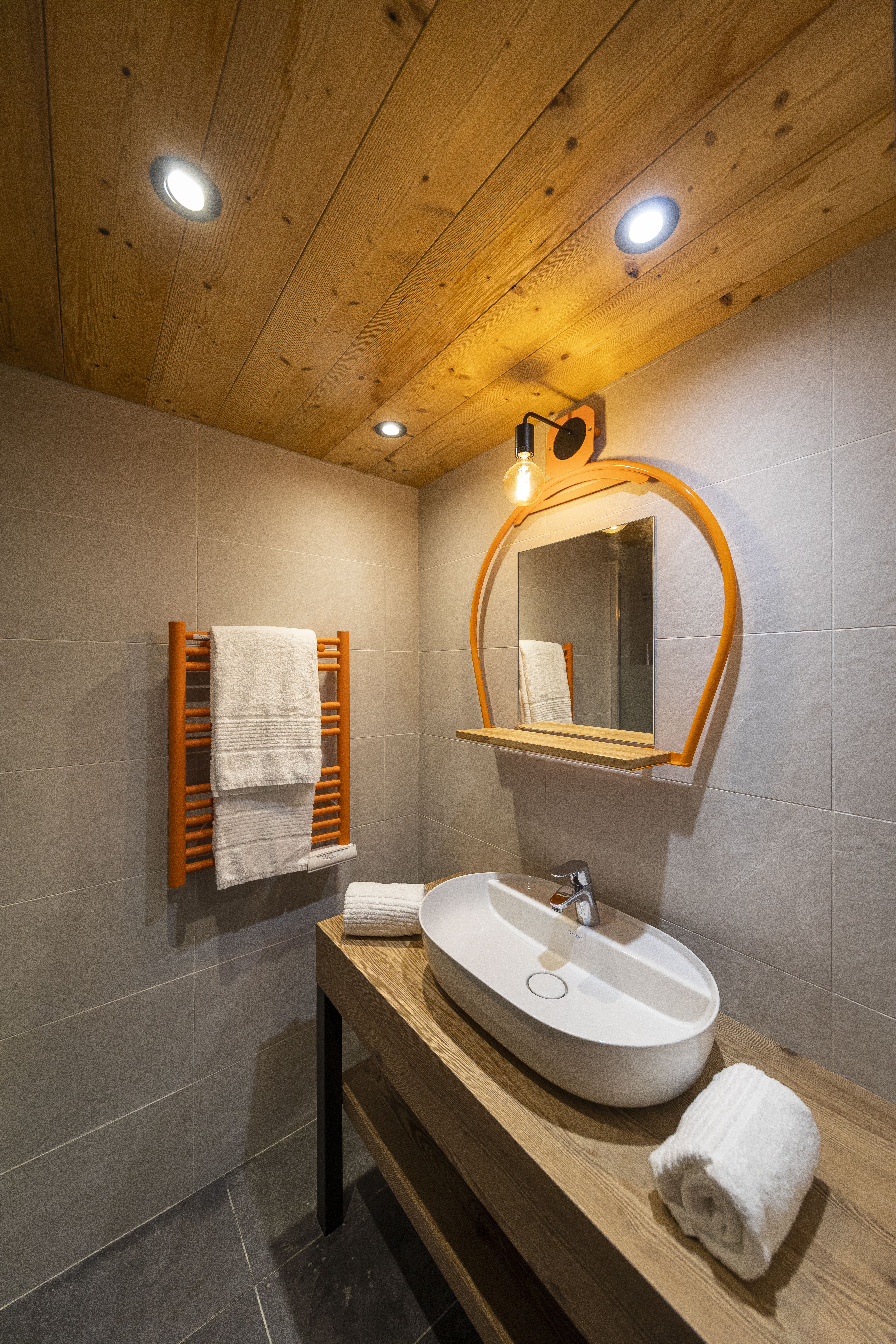 image Freshen up in the bathroom after a day of adventure.