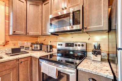 The fully-equipped kitchen features all the amenities you'd need to make a delicious meal.