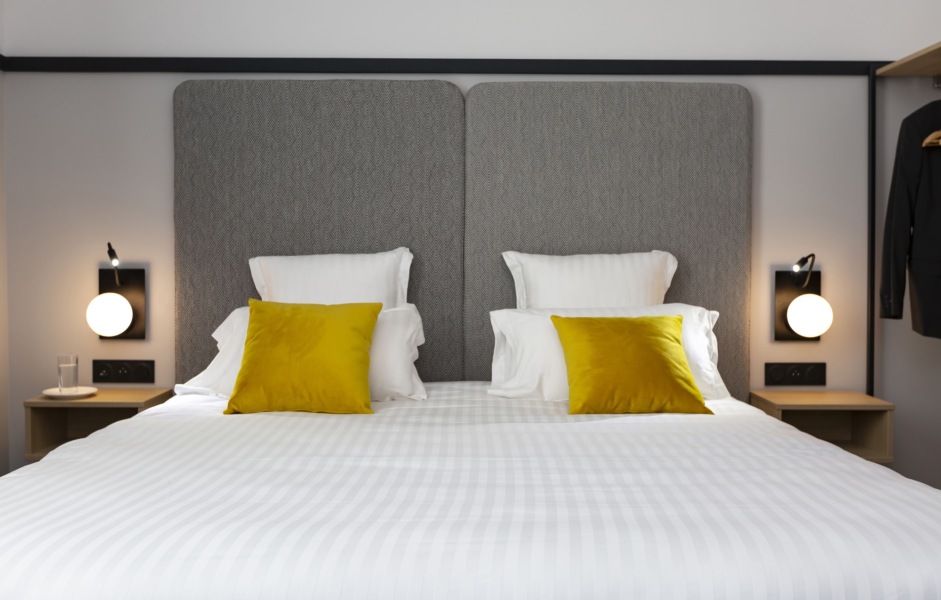 image Drift to sleep in a comfortable bed after a wonderful day outside.