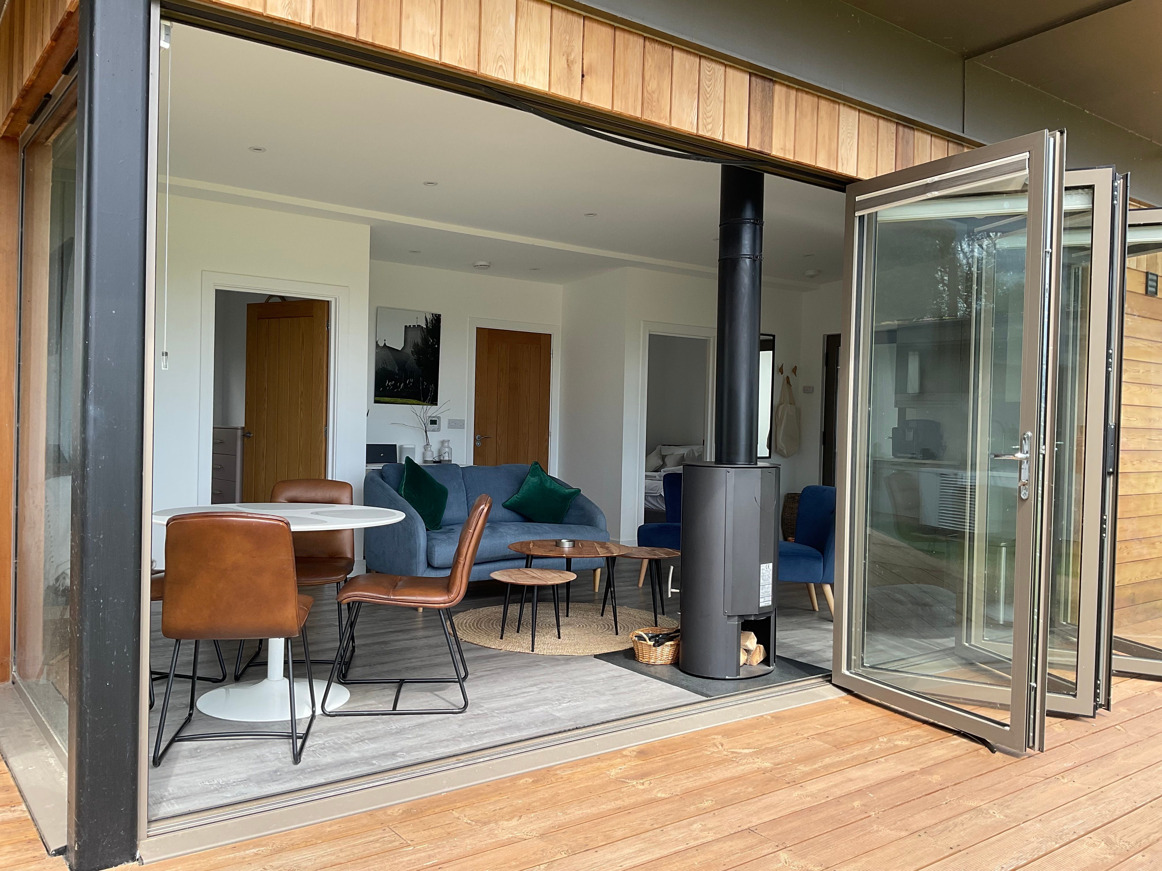 image Our lodge features floor-to-ceiling bi-fold doors that open up onto the expansive terrace.