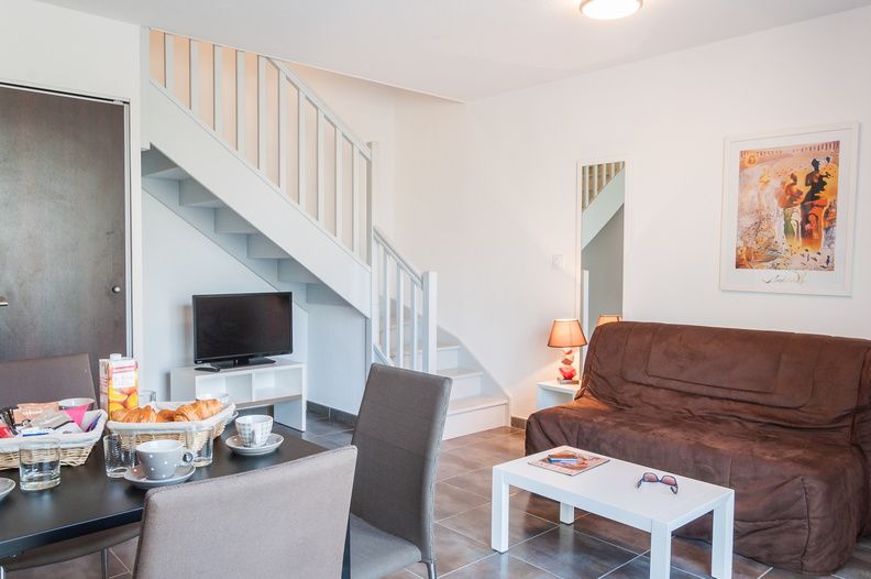 image Relax and rejuvenate in the cozy living room.