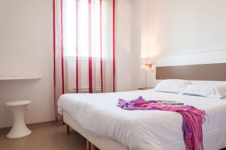 image Drift to sleep in a comfortable bed after a wonderful day outside.