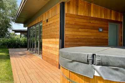 Walk out from the main area to the hot tub.