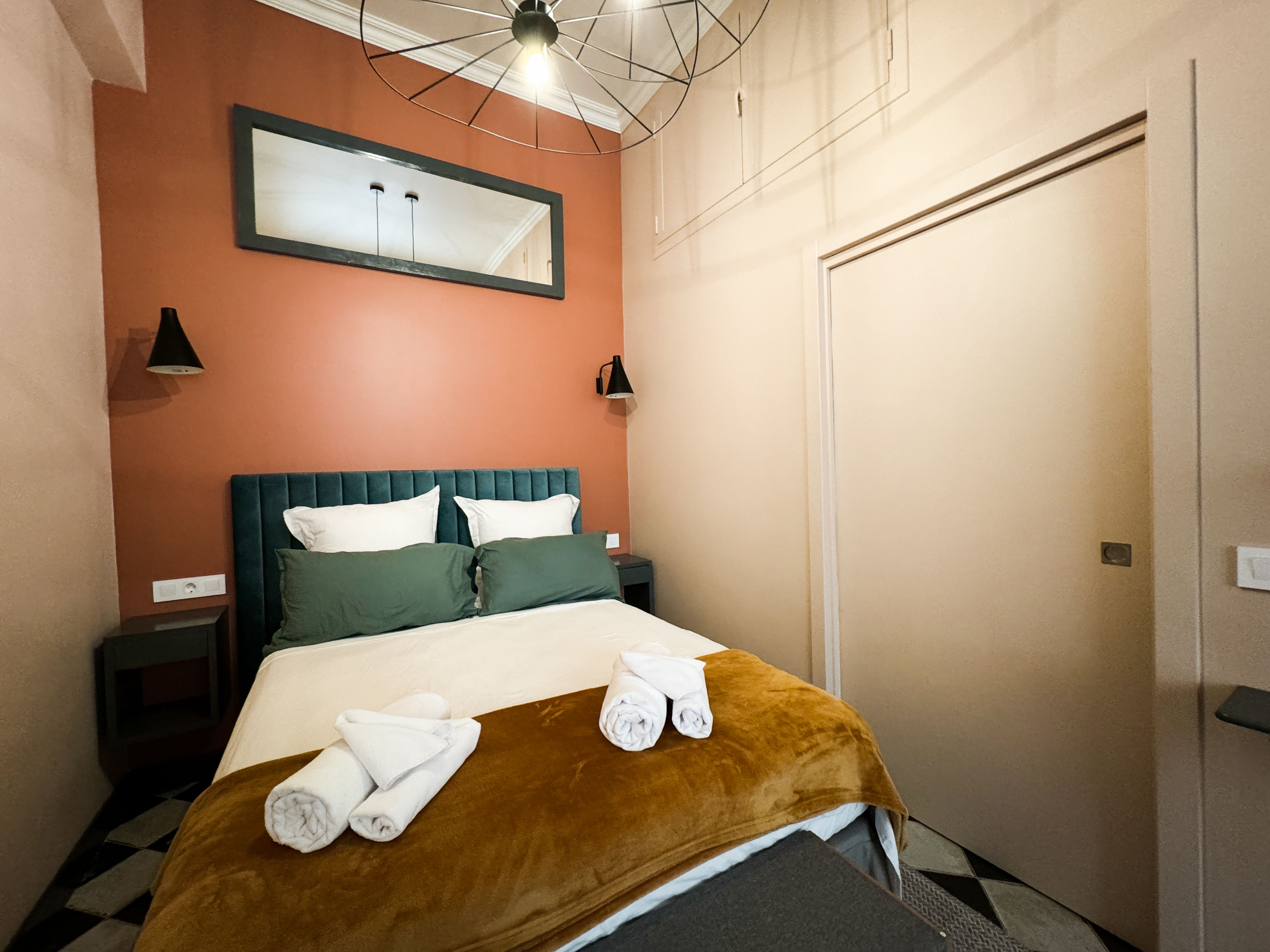 image Another view of the stylish bedroom with elegant decor and soft lighting, ensuring a comfortable and relaxing stay.