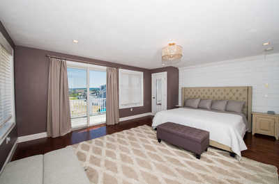 The master bedroom upstairs features 1 King bed and 1 pullout Twin bed.