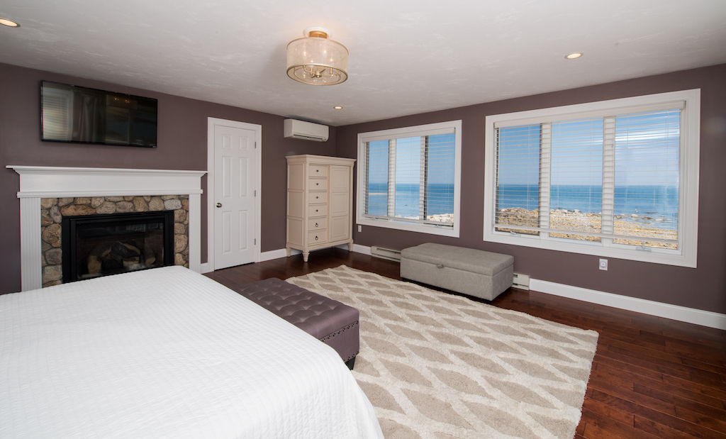 image You'll love the fireplace and flat-screen TV in the master bedroom!