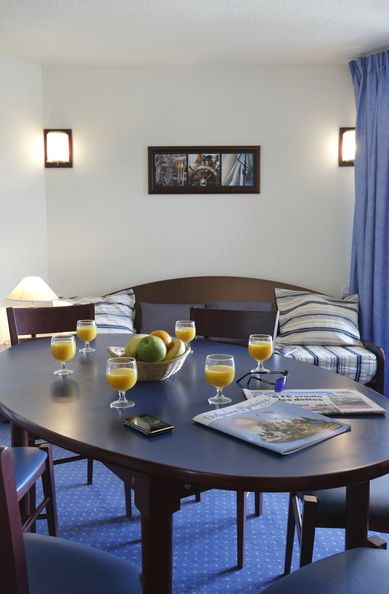 image The dining table has seating for your whole group.