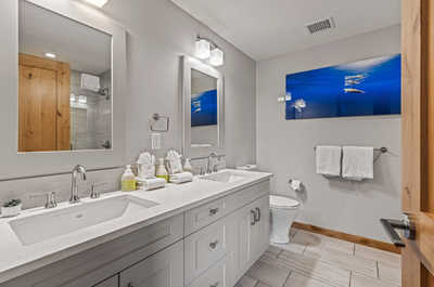 Get ready for your day in the stylish en-suite master bathroom.