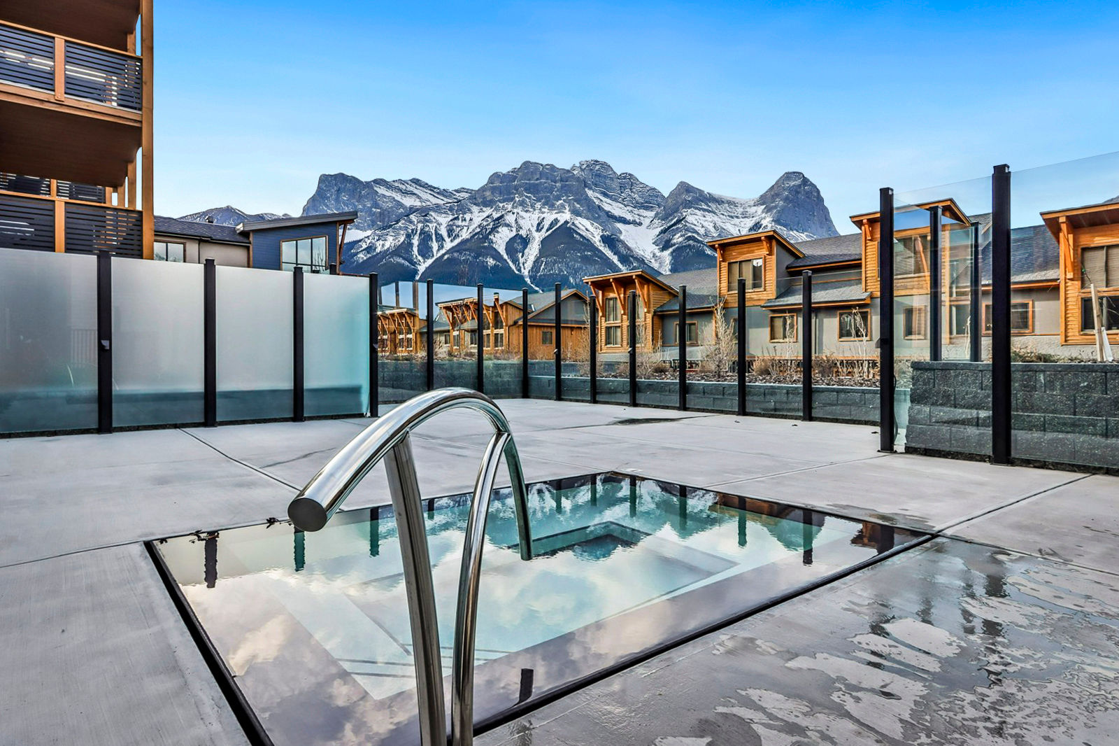 image Immerse yourself in relaxation as you soak in a gorgeous outdoor hot tub surrounded by breathtaking scenery.