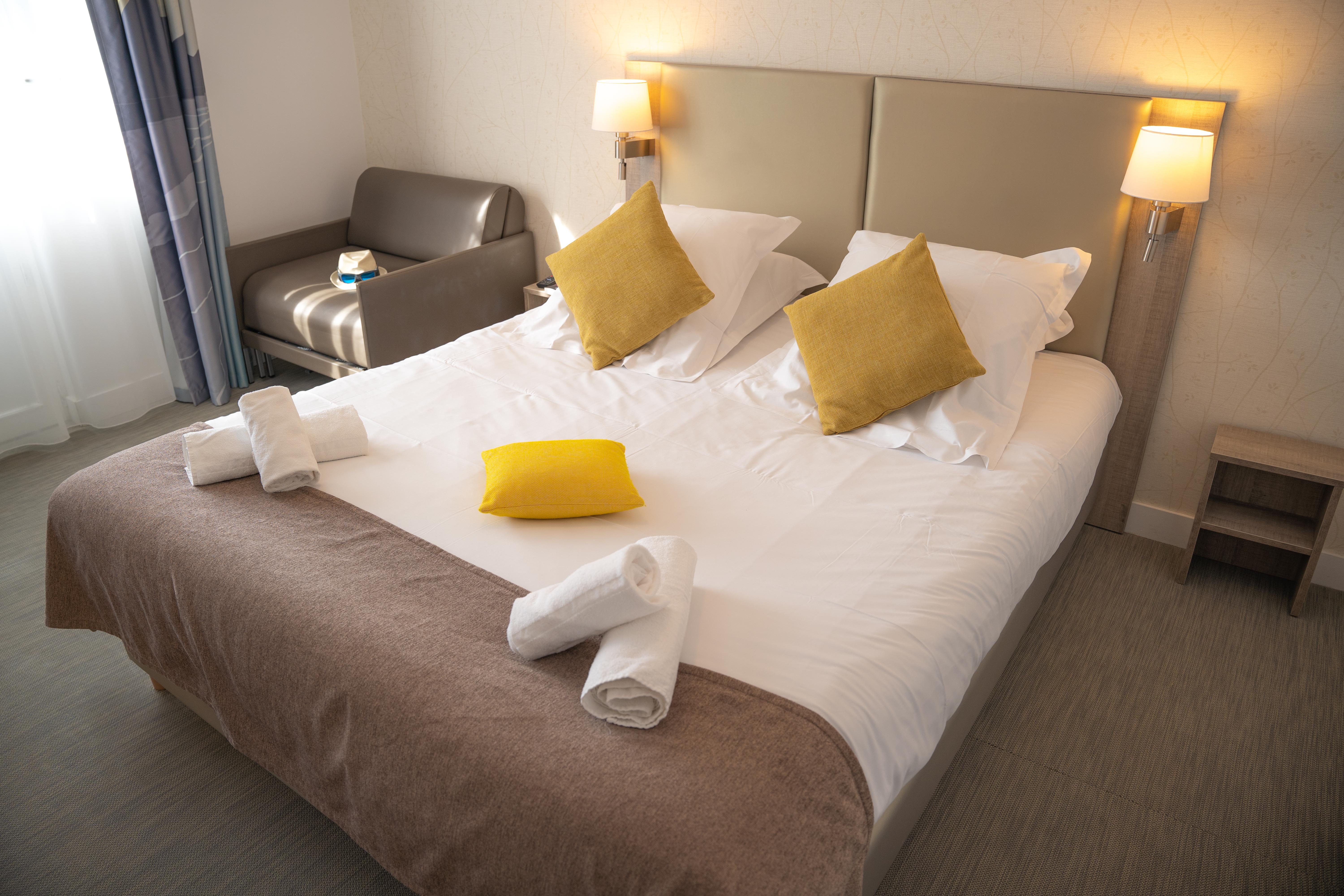image Drift to sleep in a comfortable bed after a wonderful day outside.