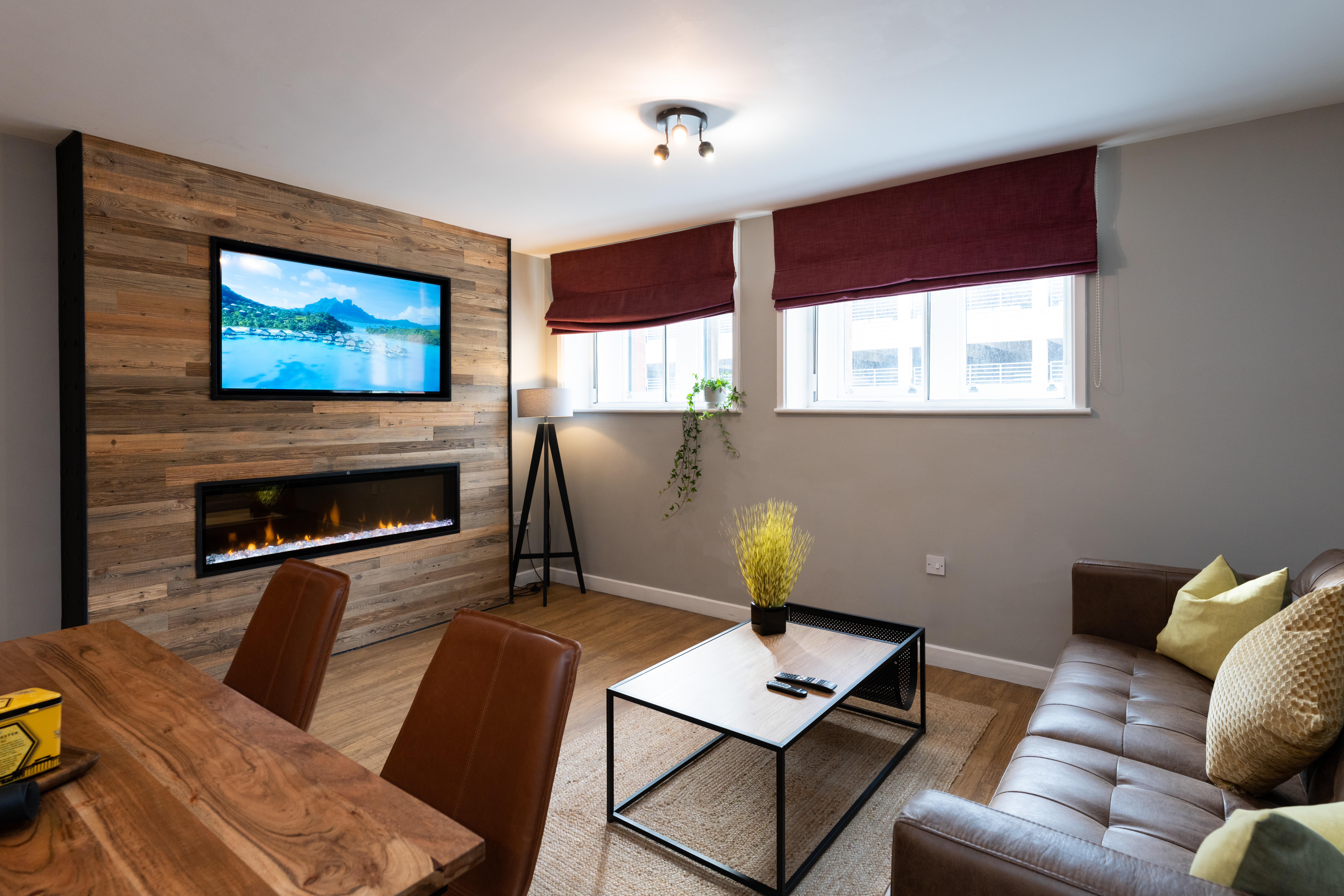 image Feature wall with smart 50" TV and 60" fireplace