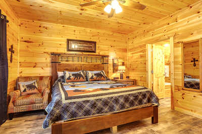 Drift to sleep in our rustic king suite.