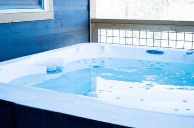 Soothe your senses with an exclusive hot tub retreat.