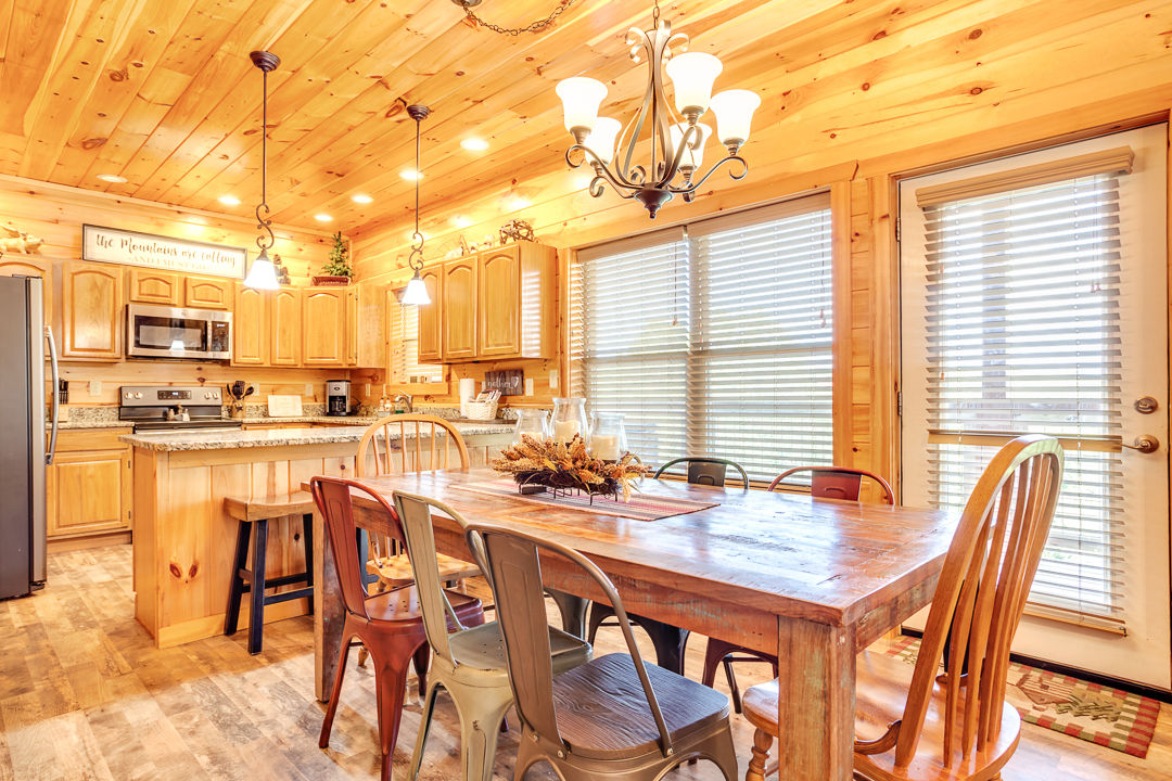 image Eat a snack by the breakfast bar or enjoy dinner courtesy of our dining table.