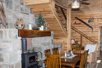 Enjoy a heartwarming dinner by the fireplace.