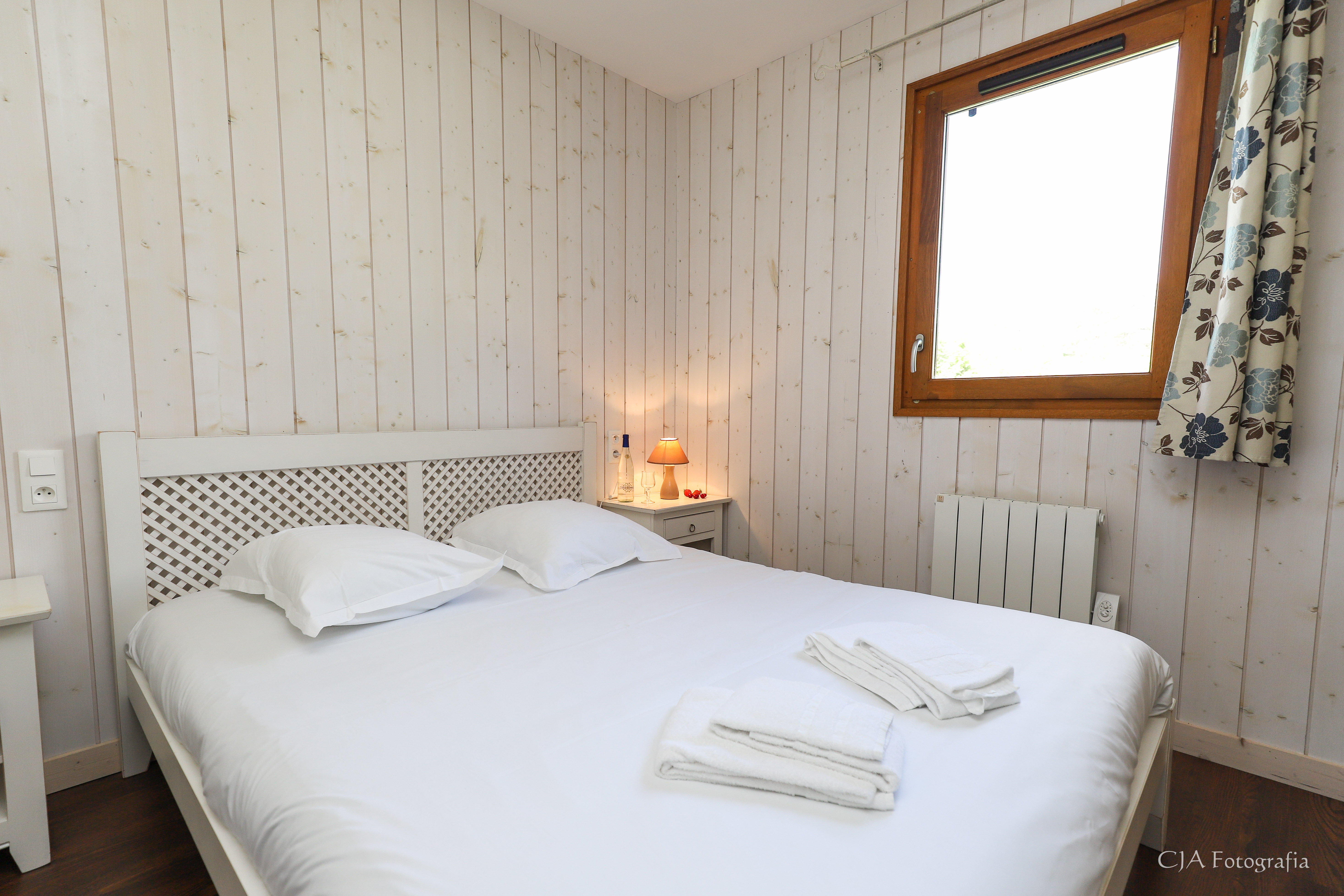 image Drift to sleep in a comfortable bed after a wonderful day outside.