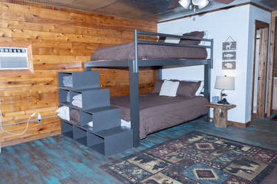 Sleep comfortably on the queen-size bunk beds.