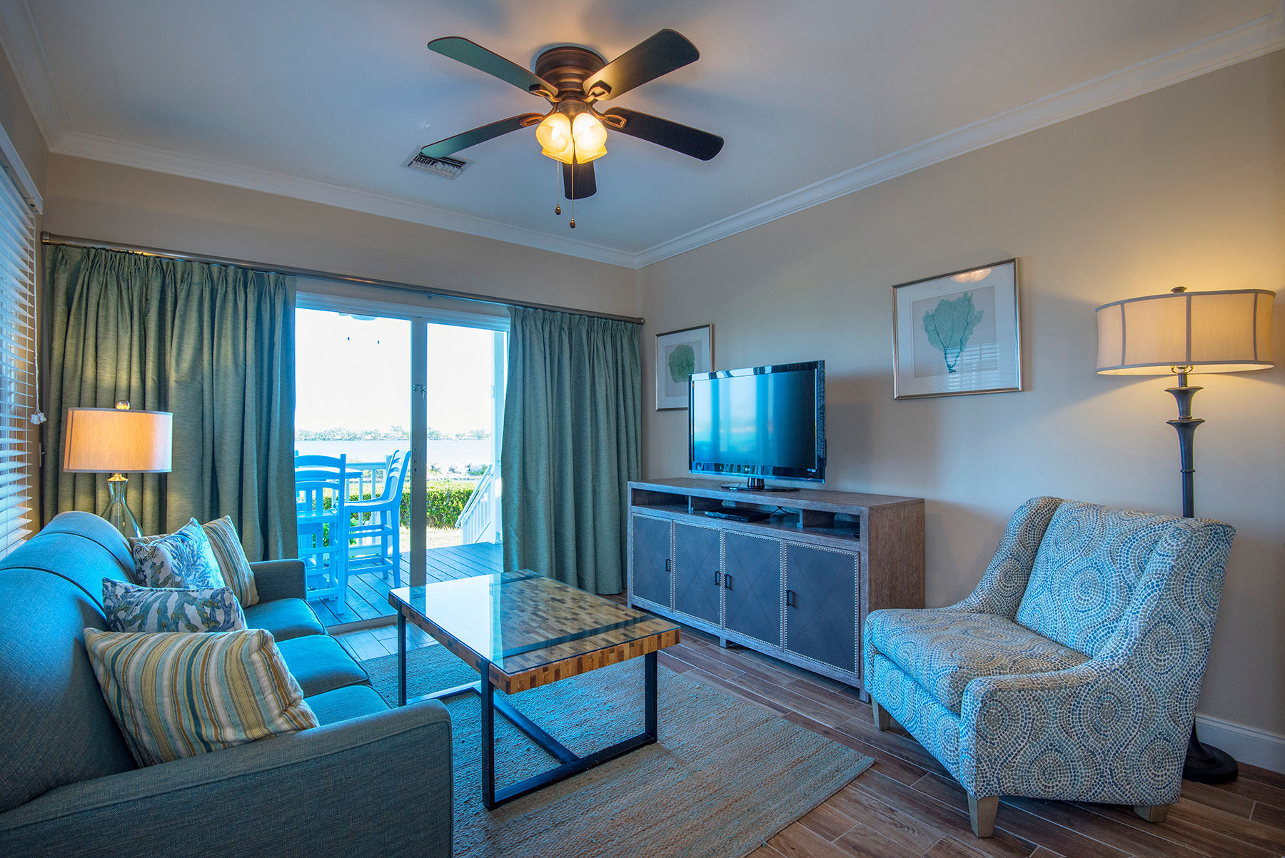 image The open living room area features cable TV.