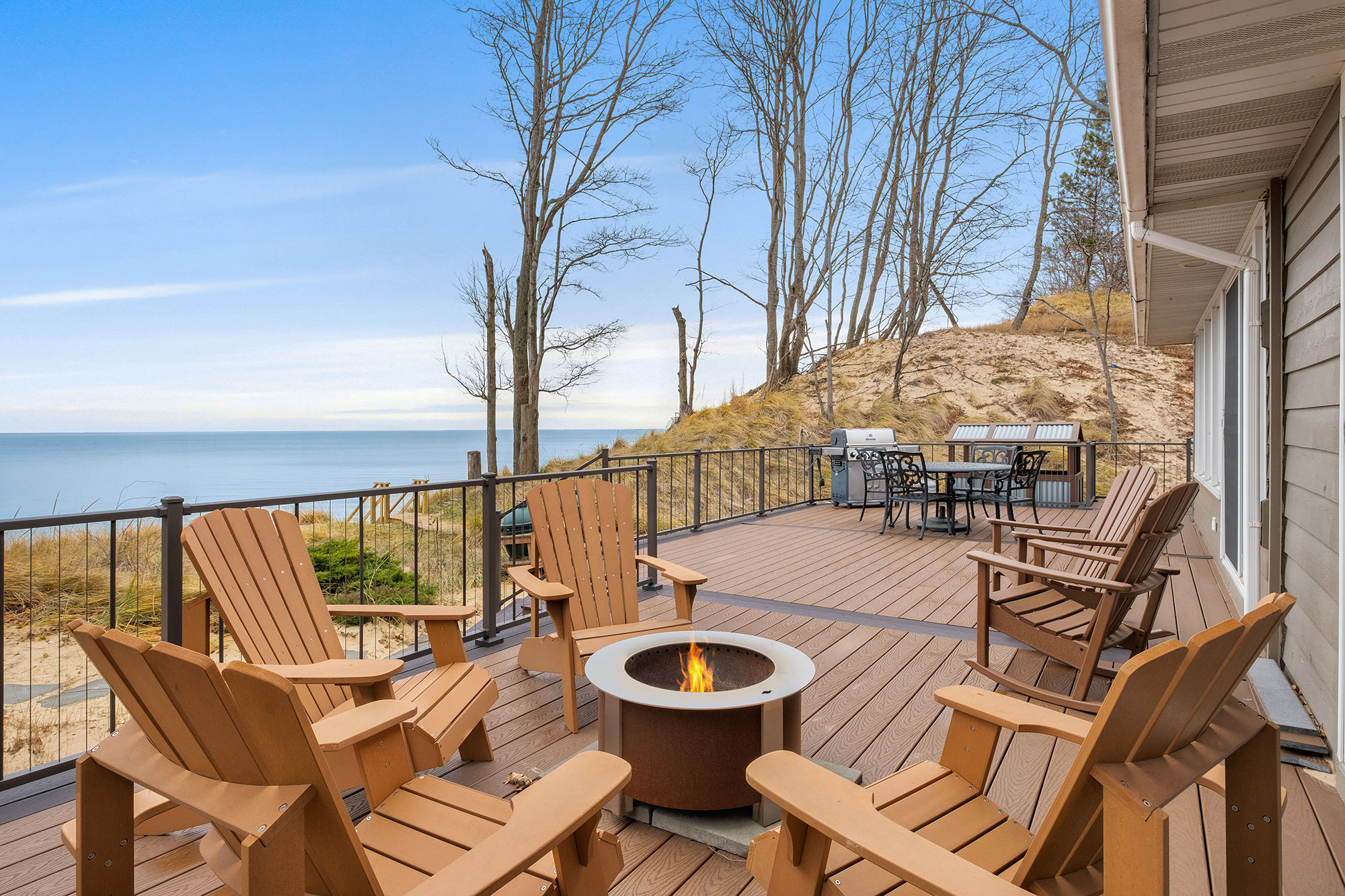 image Gather around the fire pit and watch the sunset with your family and friends. A BBQ Grill is available. 