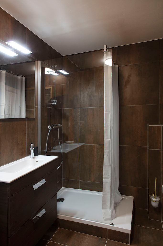 image Freshen up in our sleek bathroom.