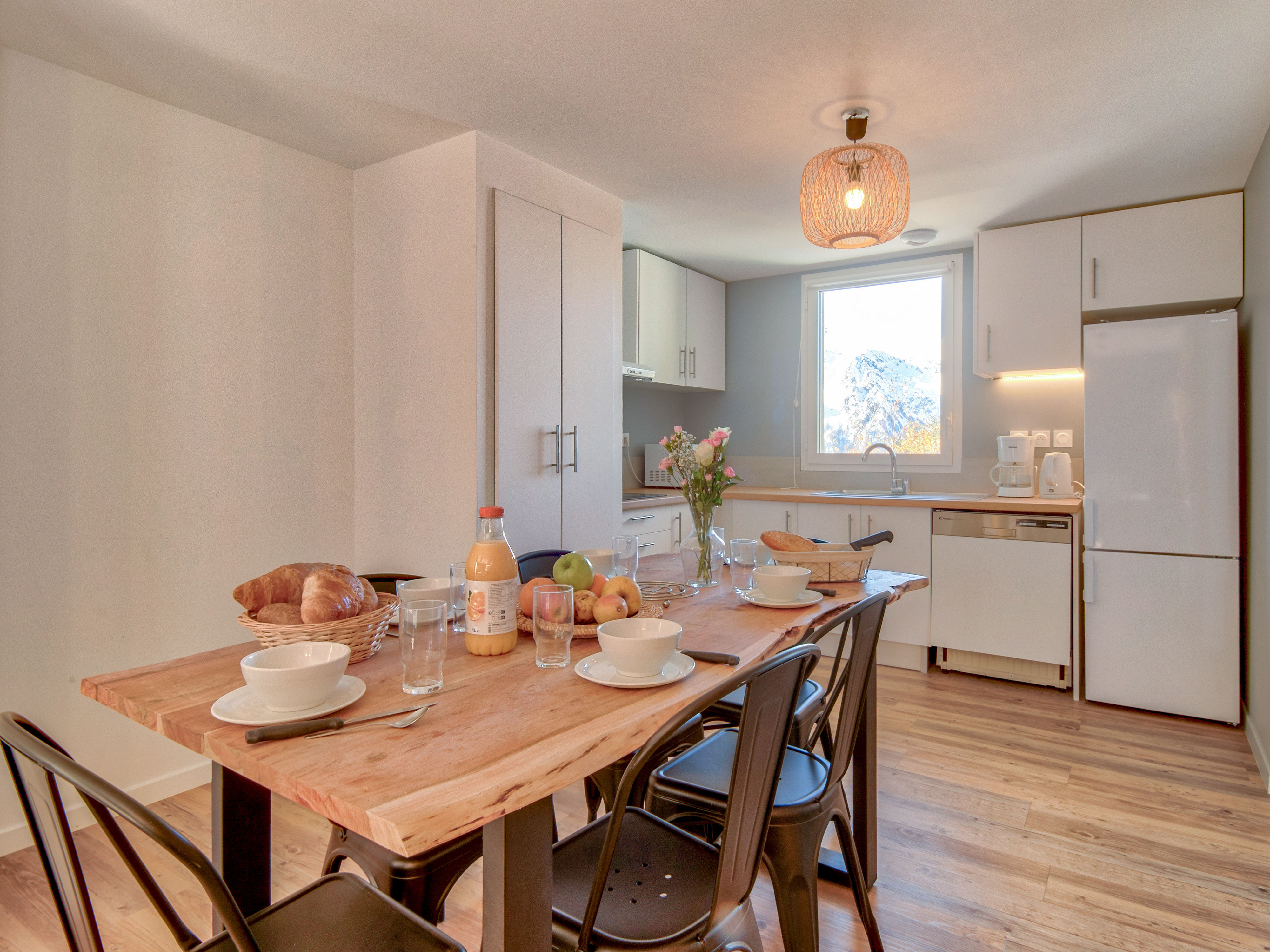 image Farmhouse charm meets modern comfort in our spacious kitchen-dining area.