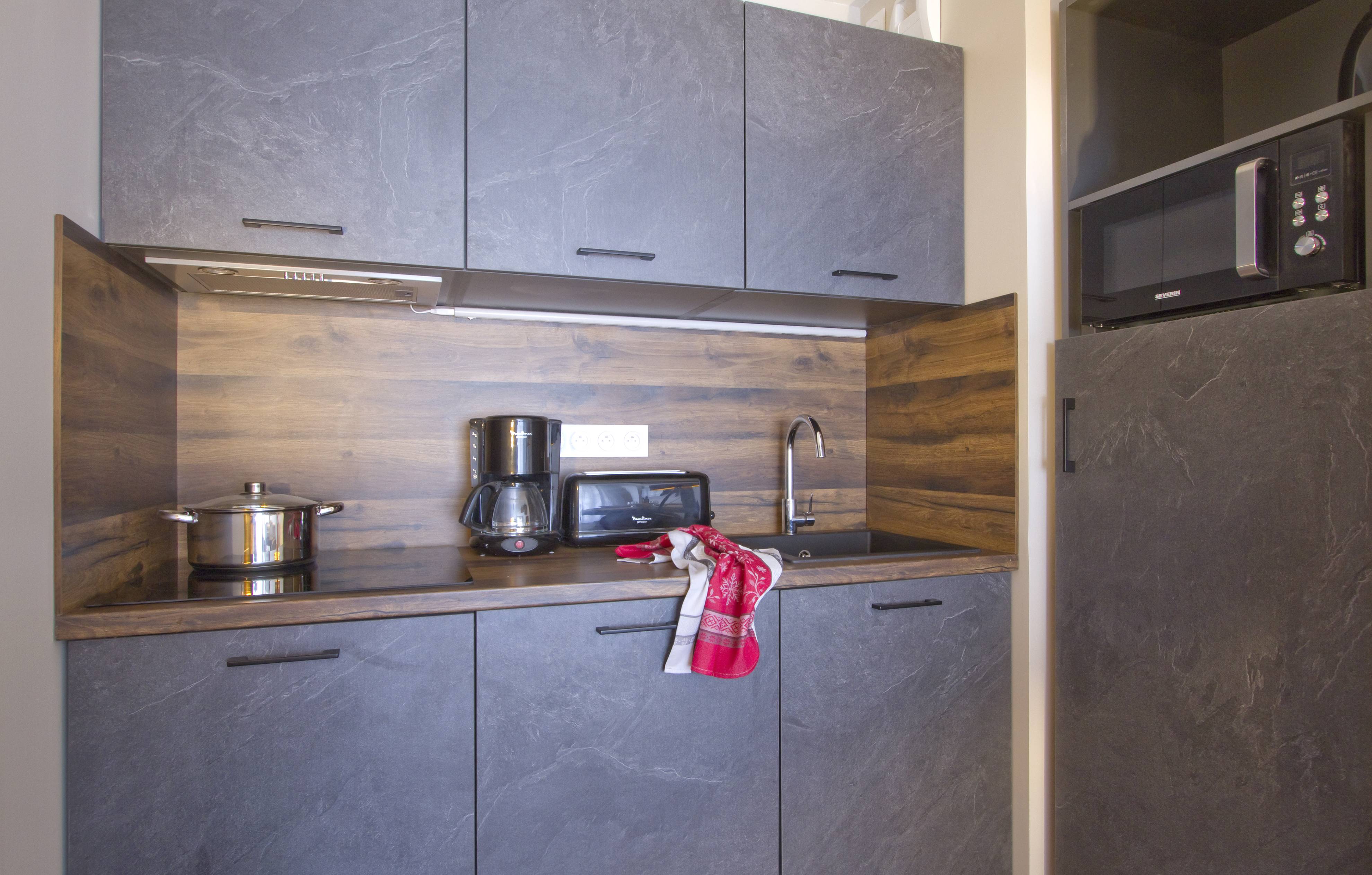 image Prepare a quick dish in your kitchenette.