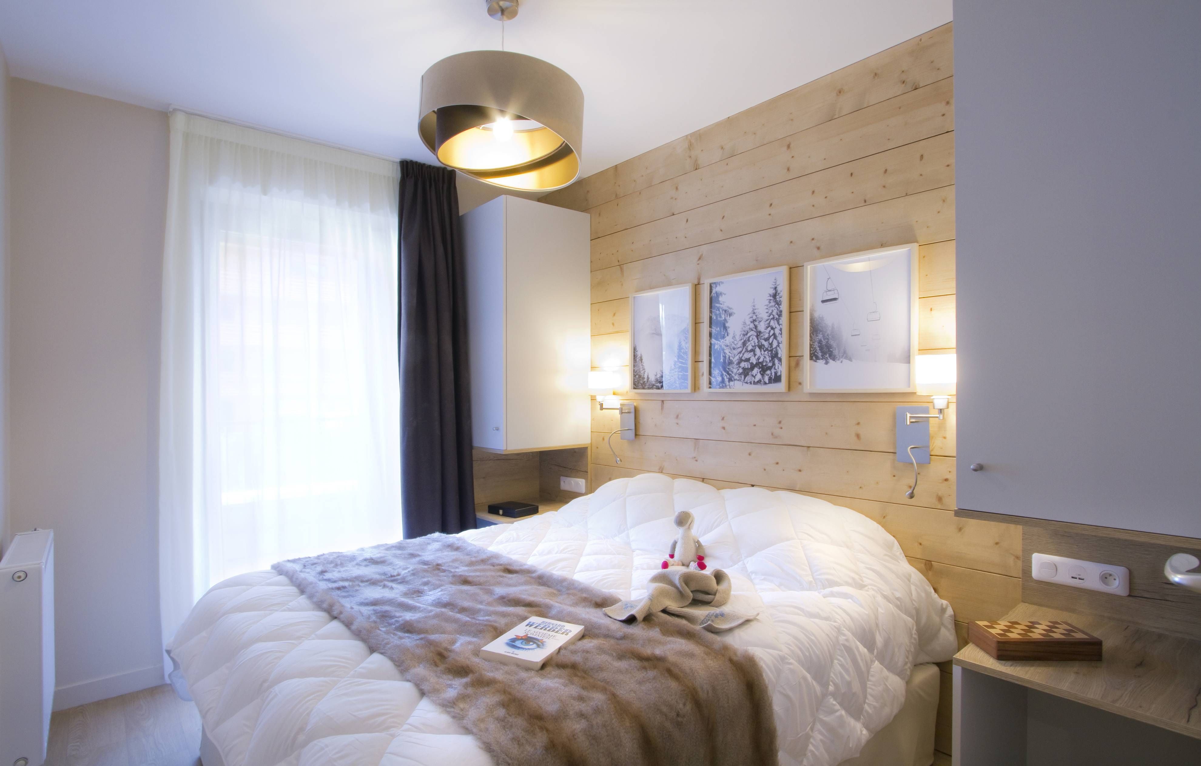 image Drift to sleep in a comfortable bed after a wonderful day outside.