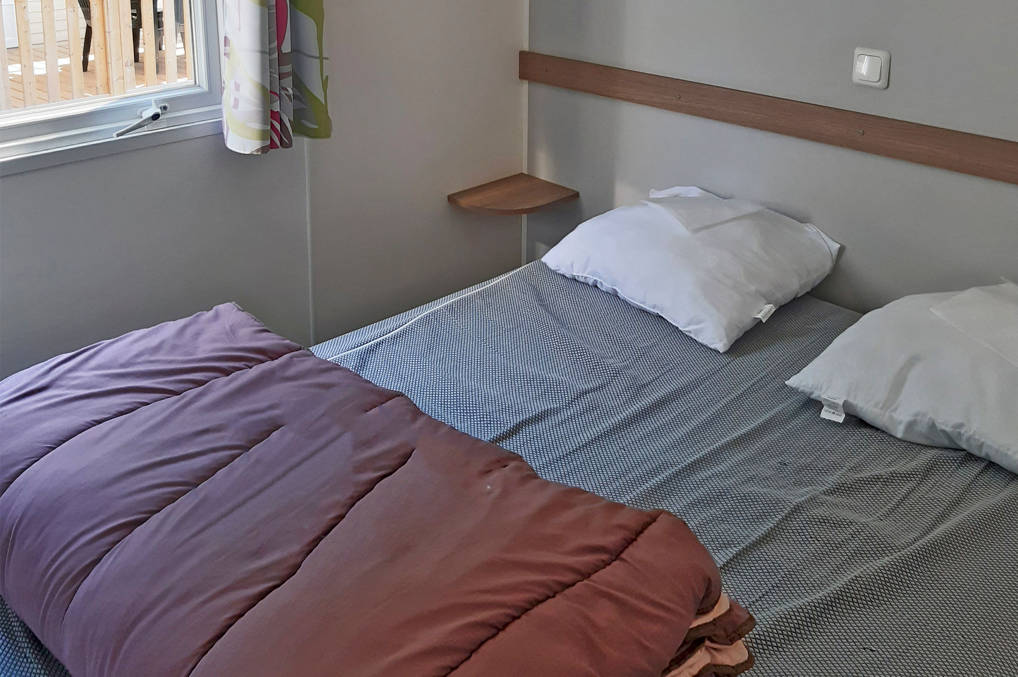 image Cozy bedroom with soft bedding, offering a peaceful retreat after a long day.