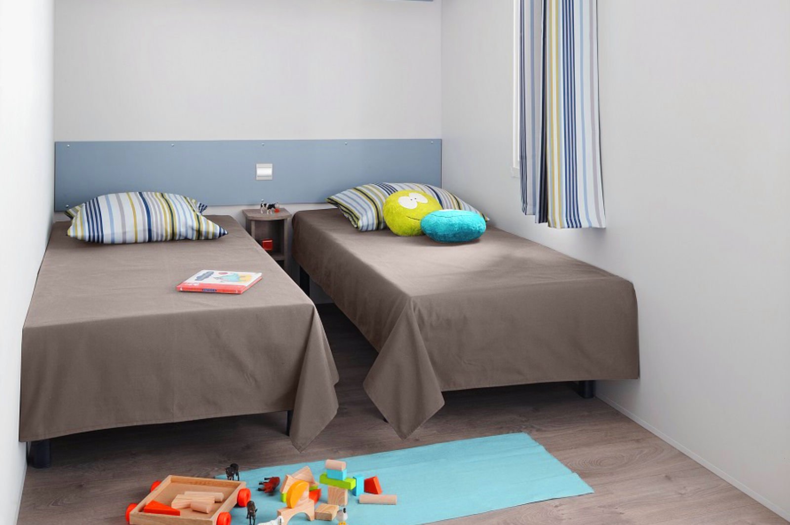 image A relaxing space with playful cushions.