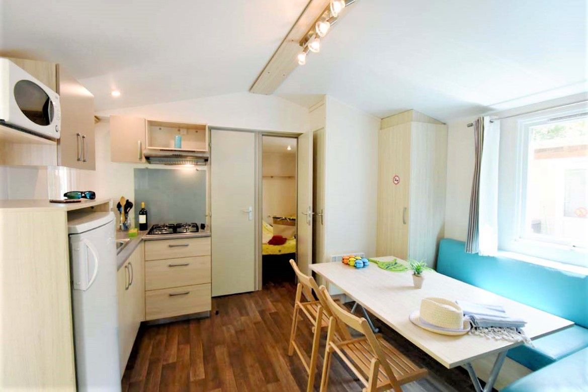 image A bright, fully-equipped tiny home kitchen.