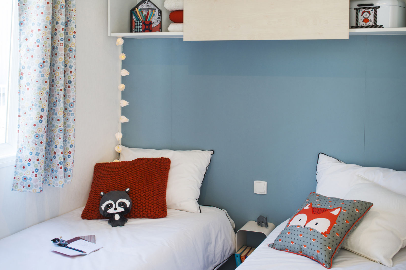image A warm, inviting bedroom with plush pillows.